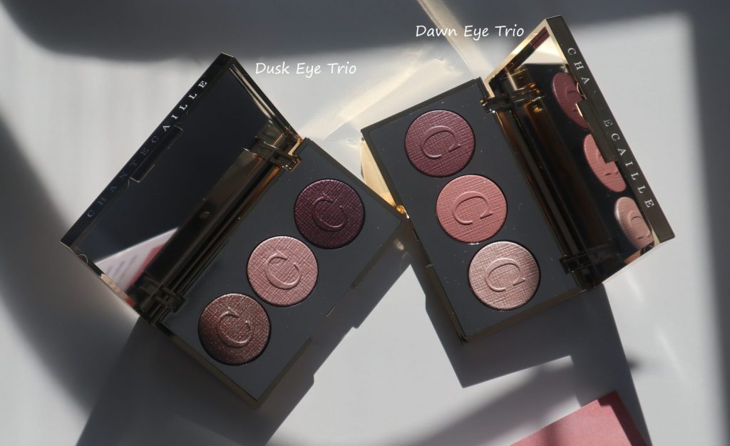 Side-by-side view of the Chantecaille Flamingo Dawn and Dusk Eye Trios in their packaging.