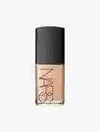 A close-up shot of the NARS Sheer Glow Foundation bottle against a minimalist backdrop.