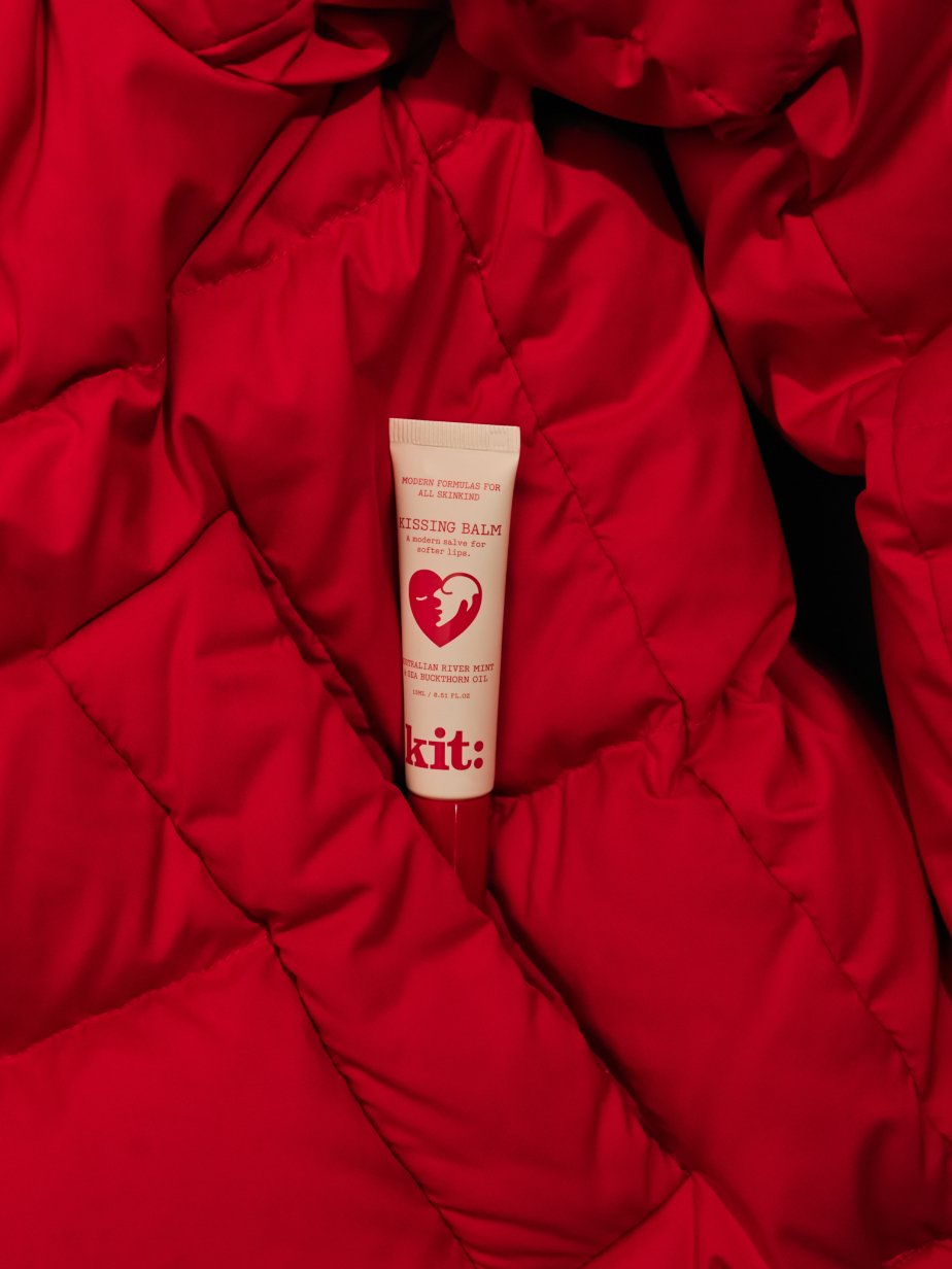kit: Kissing Balm with its signature metal applicator.