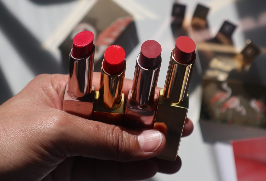 Chantecaille Flamingo Lip Chic products showing the elegant slim tube design.