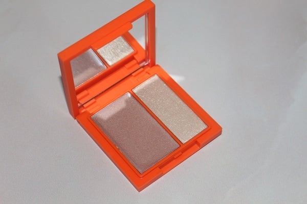 Open REESON Beauty Highlighter Duo compact showing both balm and powder sections.